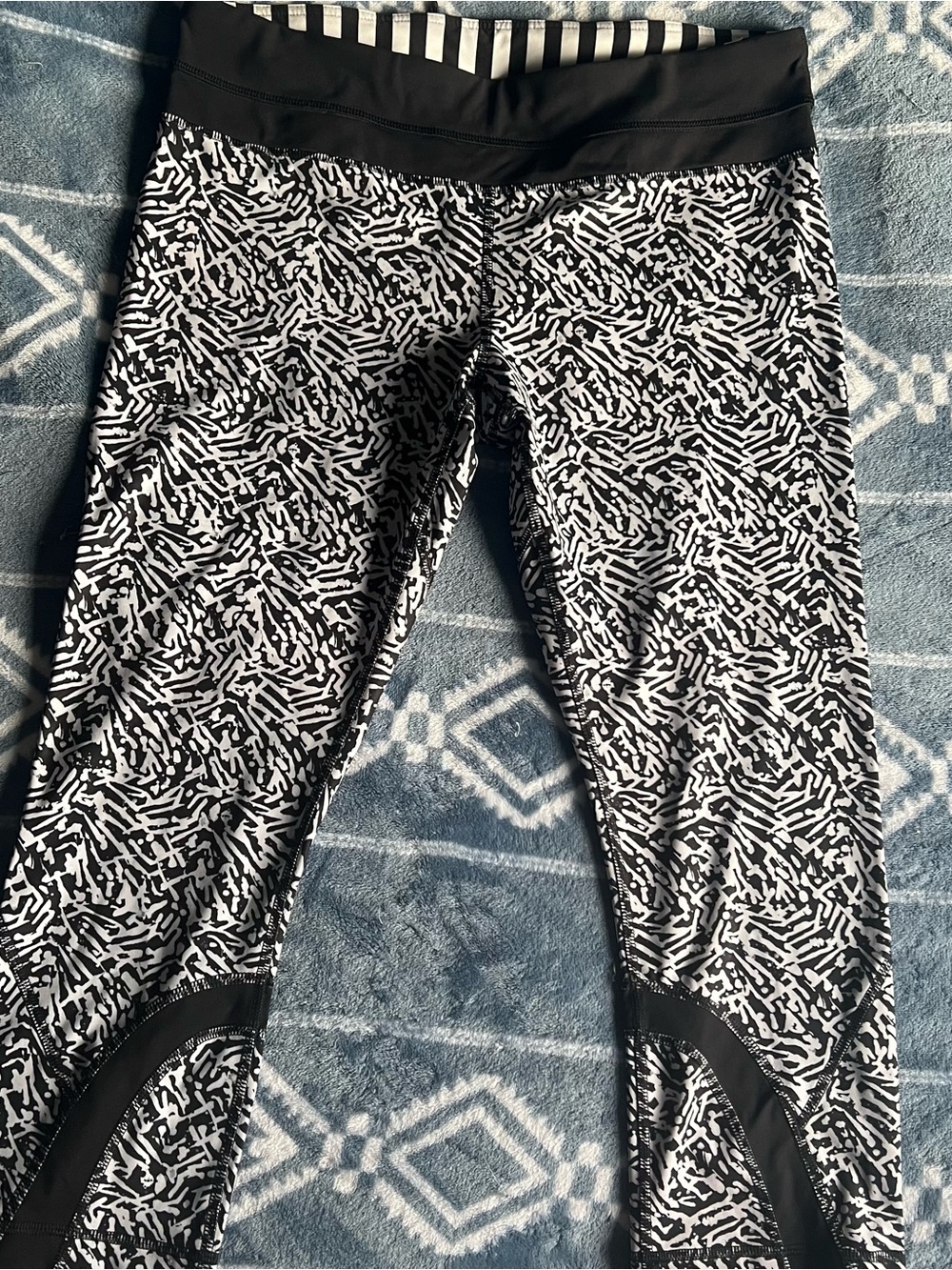 Lululemon Run Inspire Crop II leggings featuring a black and white